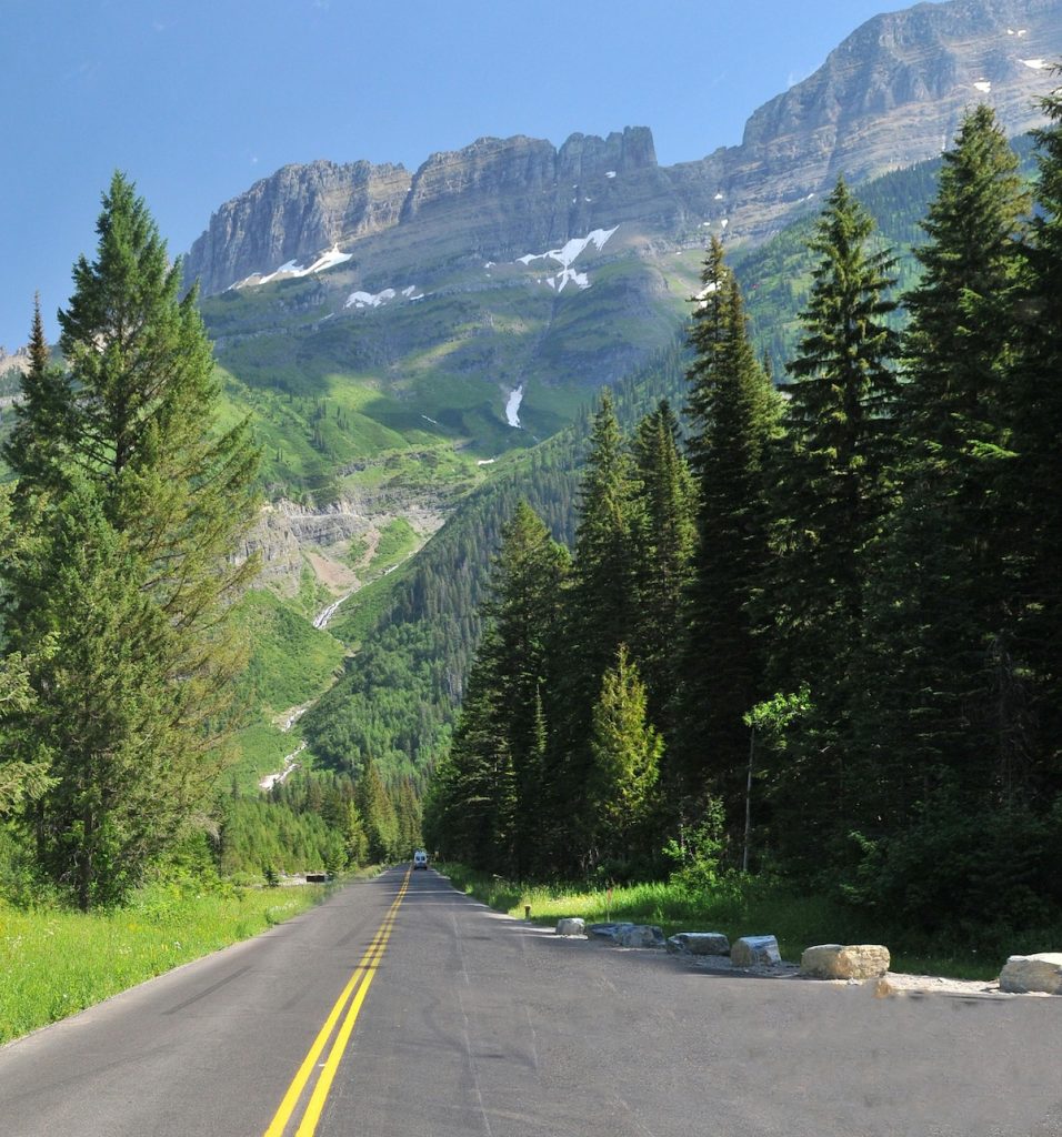 Glacier National Park mountain peaks with forest in foreground