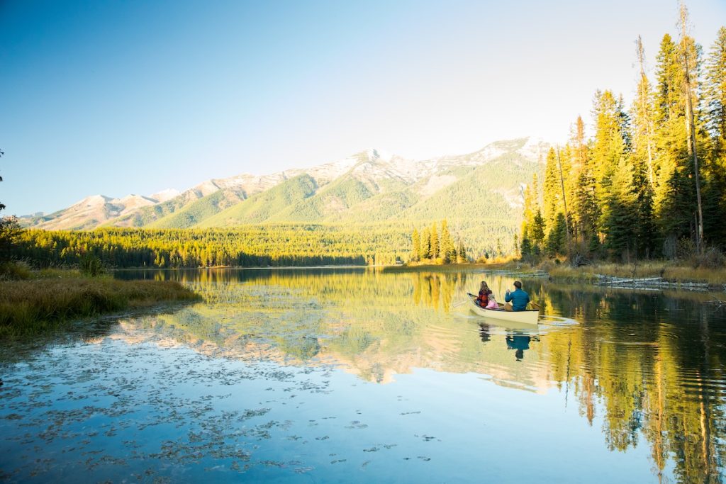 Boating on glassy Holland Lake